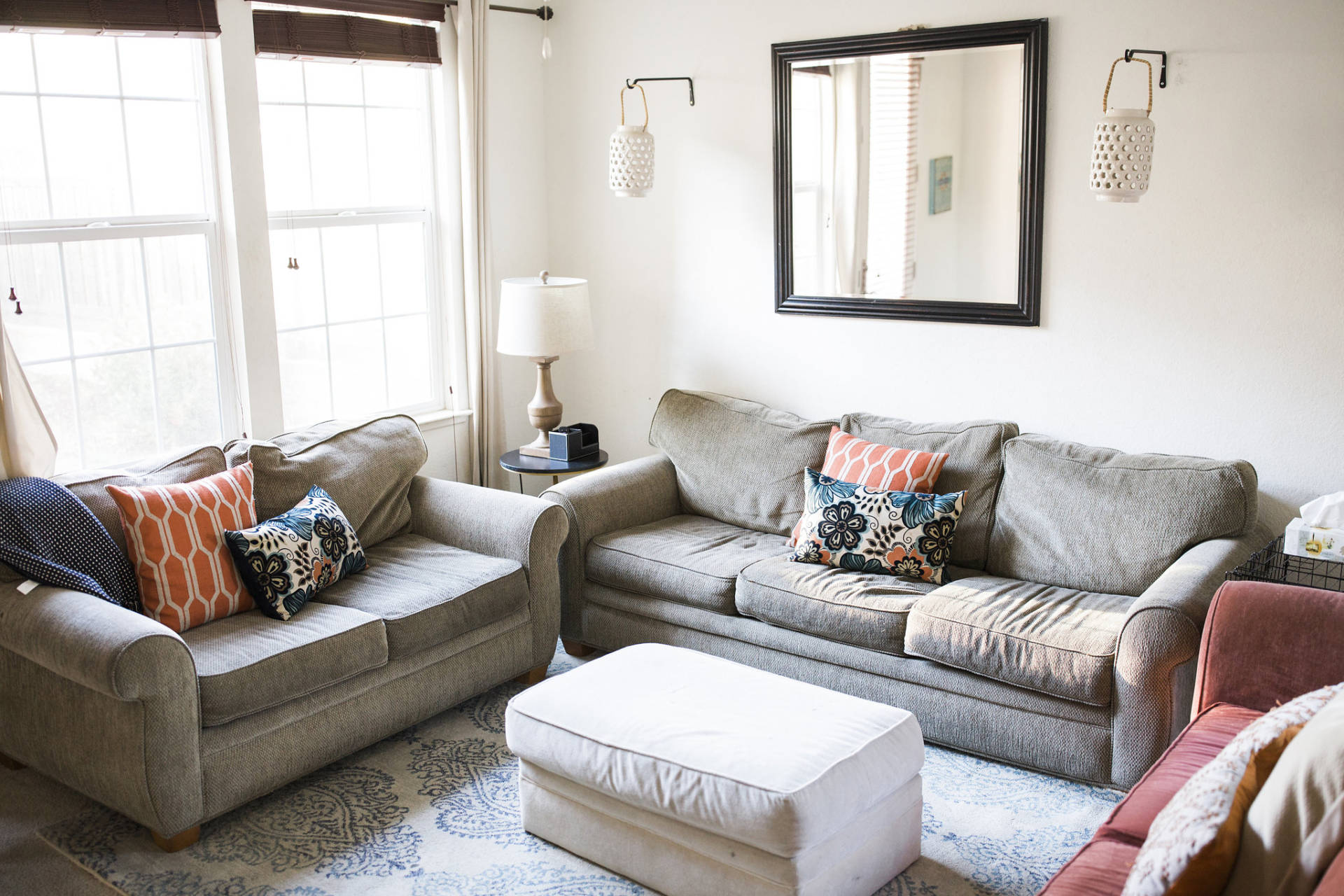 My complete living room make over is finally here! We spruced up the space with the same couches and few key items.